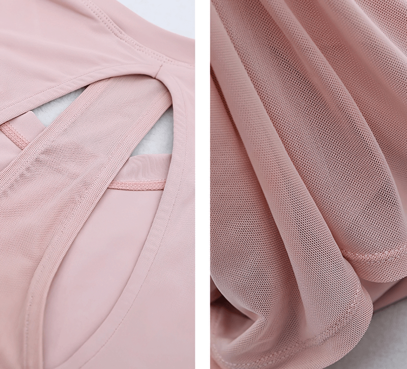 Close-up of a pink mesh yoga t-shirt with beautiful back design, showing breathable spandex fabric for comfort and flexibility.