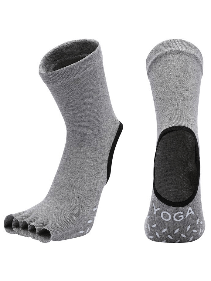 Gray silicone non-slip toeless pilates socks with five fingers for yoga, featuring high elasticity and optimal grip.