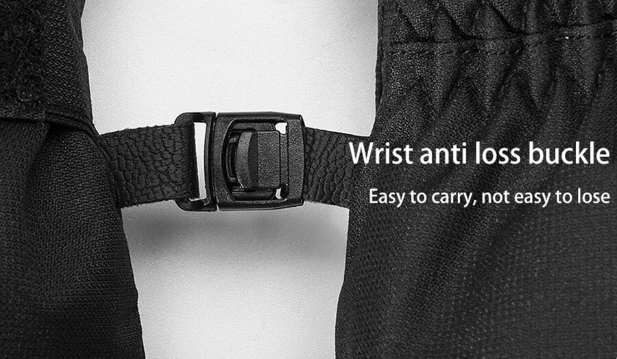 Close-up of ski glove wristband with anti-loss buckle, showing black textured strap and secure clip for easy carrying and safety.