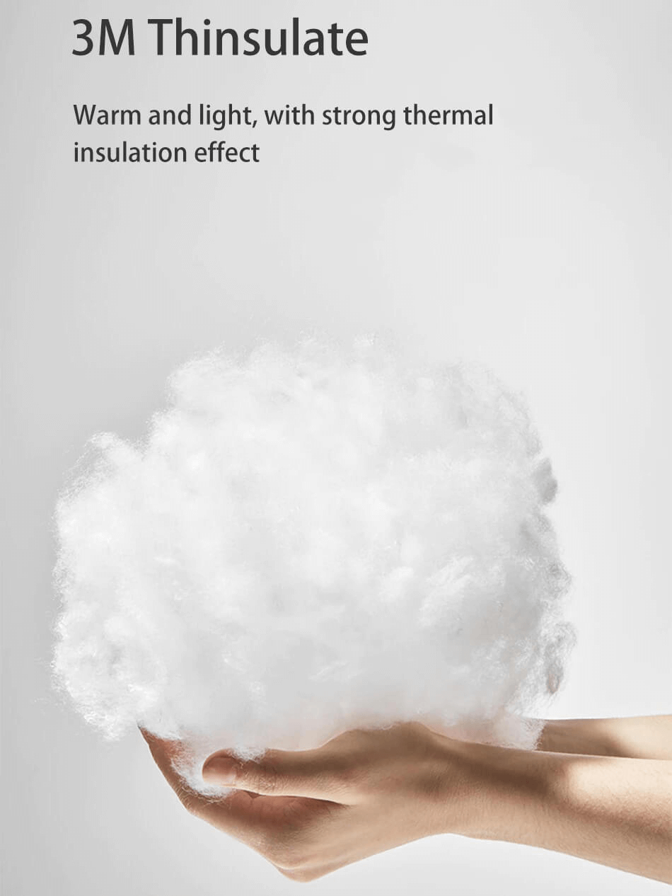 3M Thinsulate insulation held in hands, showcasing its light and warm properties for effective thermal insulation.