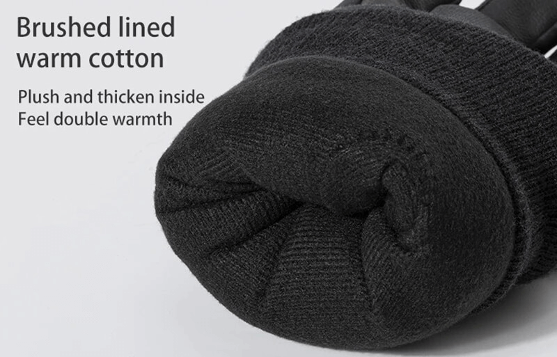 Close-up of black ski glove with brushed lined warm cotton and plush interior for enhanced warmth.