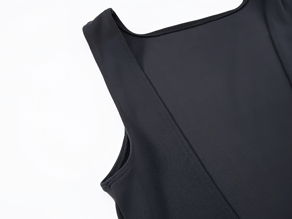 Close-up of sleek black backless jumpsuit top with flared leg design for women, perfect for yoga, dance, or casual wear.