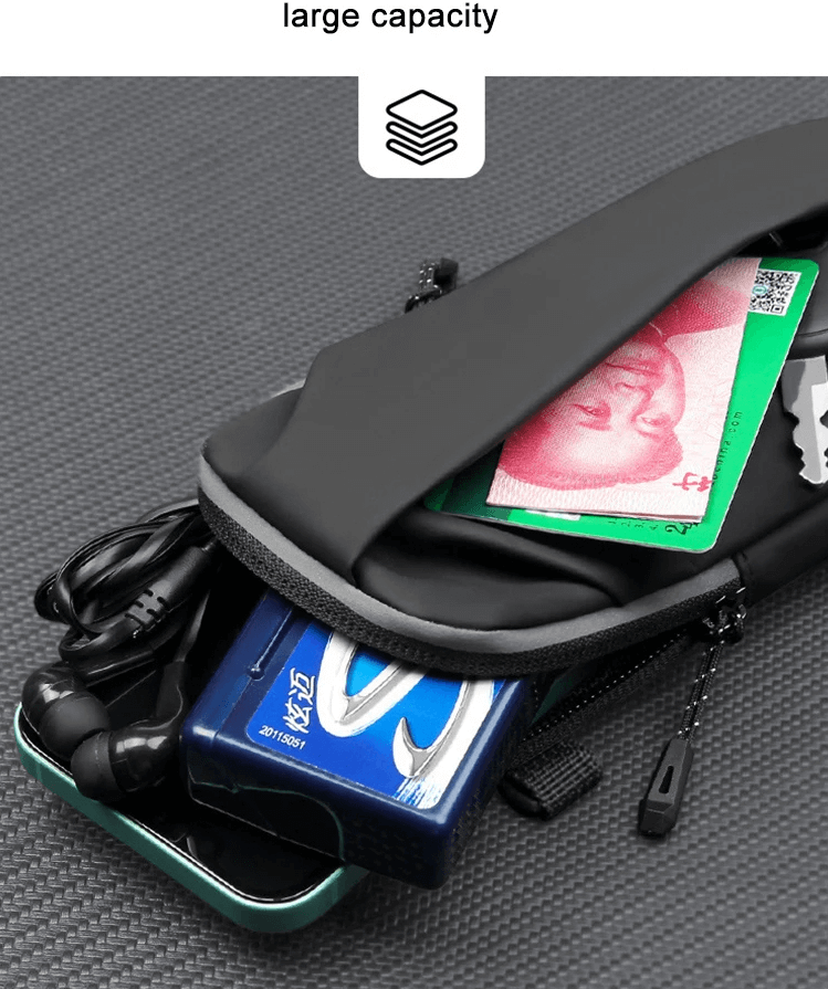 Spacious sleek black crossbody bag with essentials like phone, cash, and headphones for modern urban lifestyle.