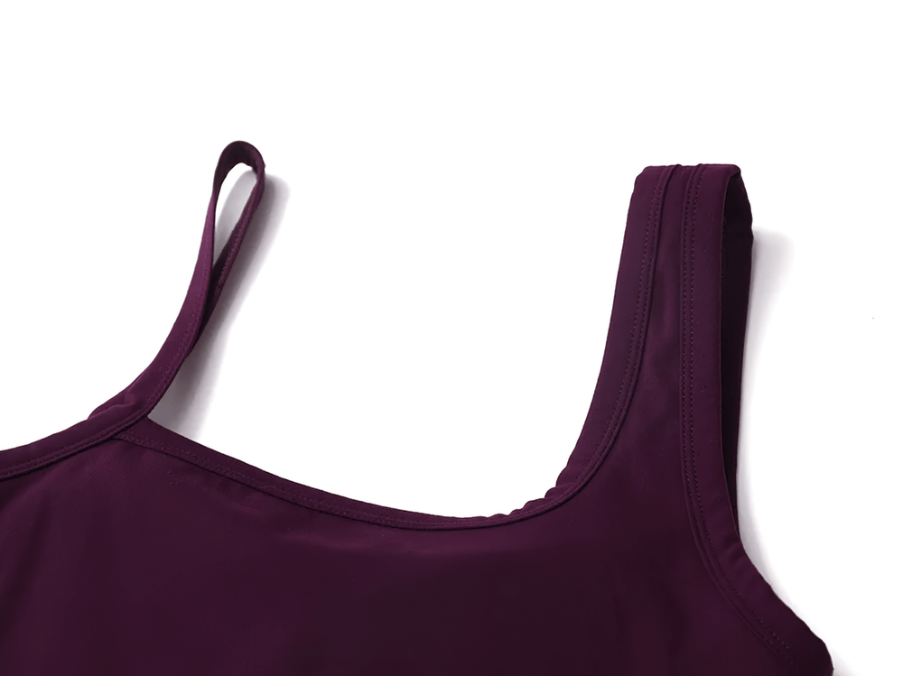 Deep purple square-neck tank top with built-in bra. Stylish activewear for workouts; breathable fabric with minimalistic straps.