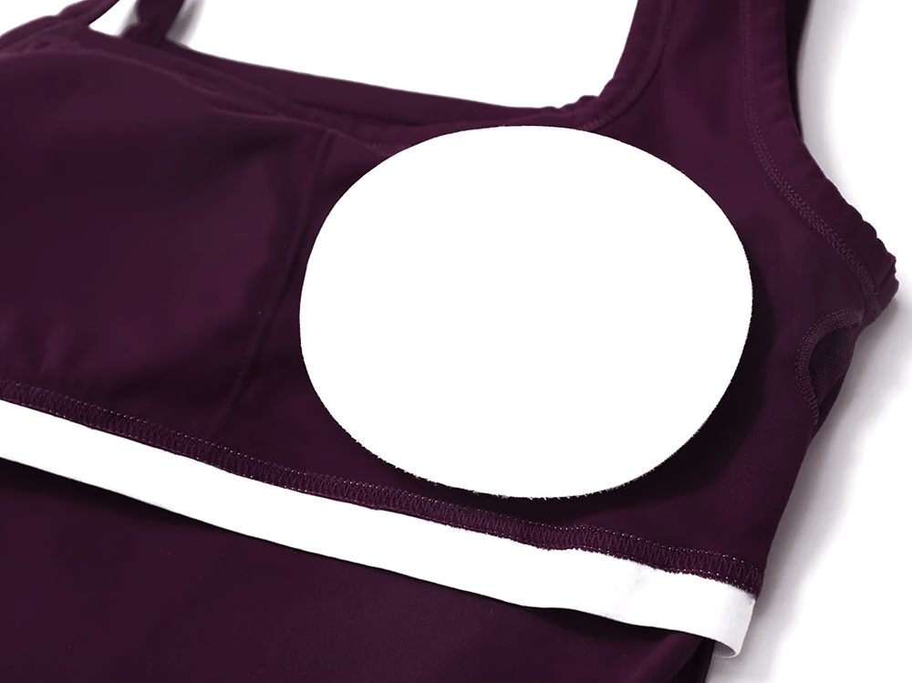 Deep purple square-neck tank top with built-in padded support, ideal for workouts and everyday wear. Stylish and breathable fabric.