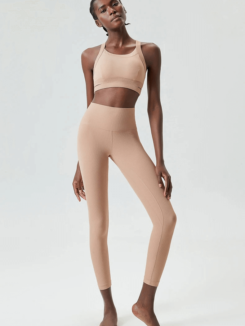 Woman in beige Sleek Stretch Fitness Yoga Set SF2088. High-impact gym wear, slim fit, quick-dry, durable, and flexible suit.