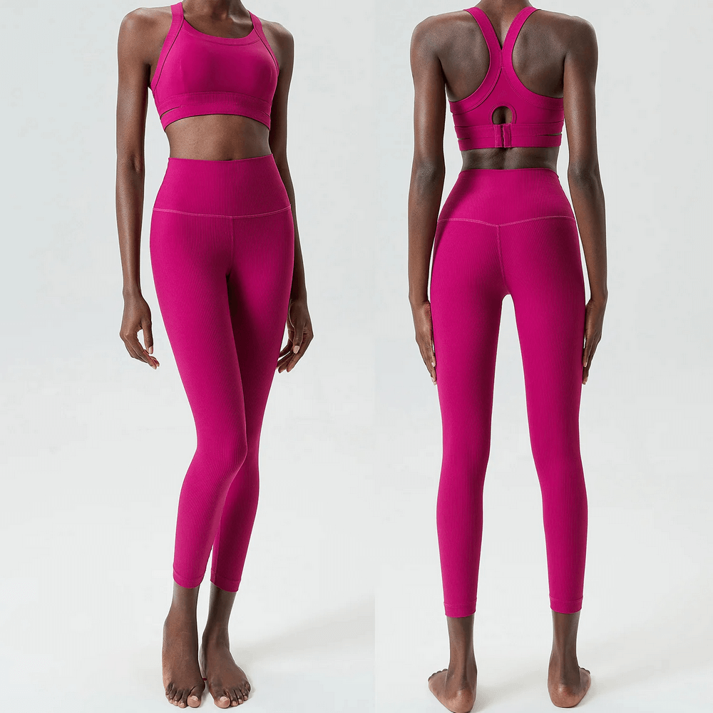 Women's Sleek Stretch Fitness Yoga Set SF2088 in vibrant pink, showcasing a sleeveless top and high-waisted leggings for active comfort.