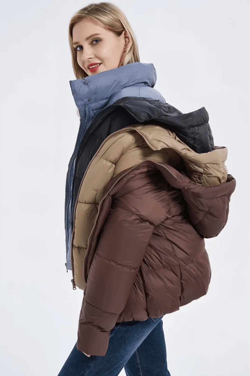 Model displaying Slim Fit Duck Down Jackets in assorted colors with a detachable hood, showcasing warmth and style for chilly days.