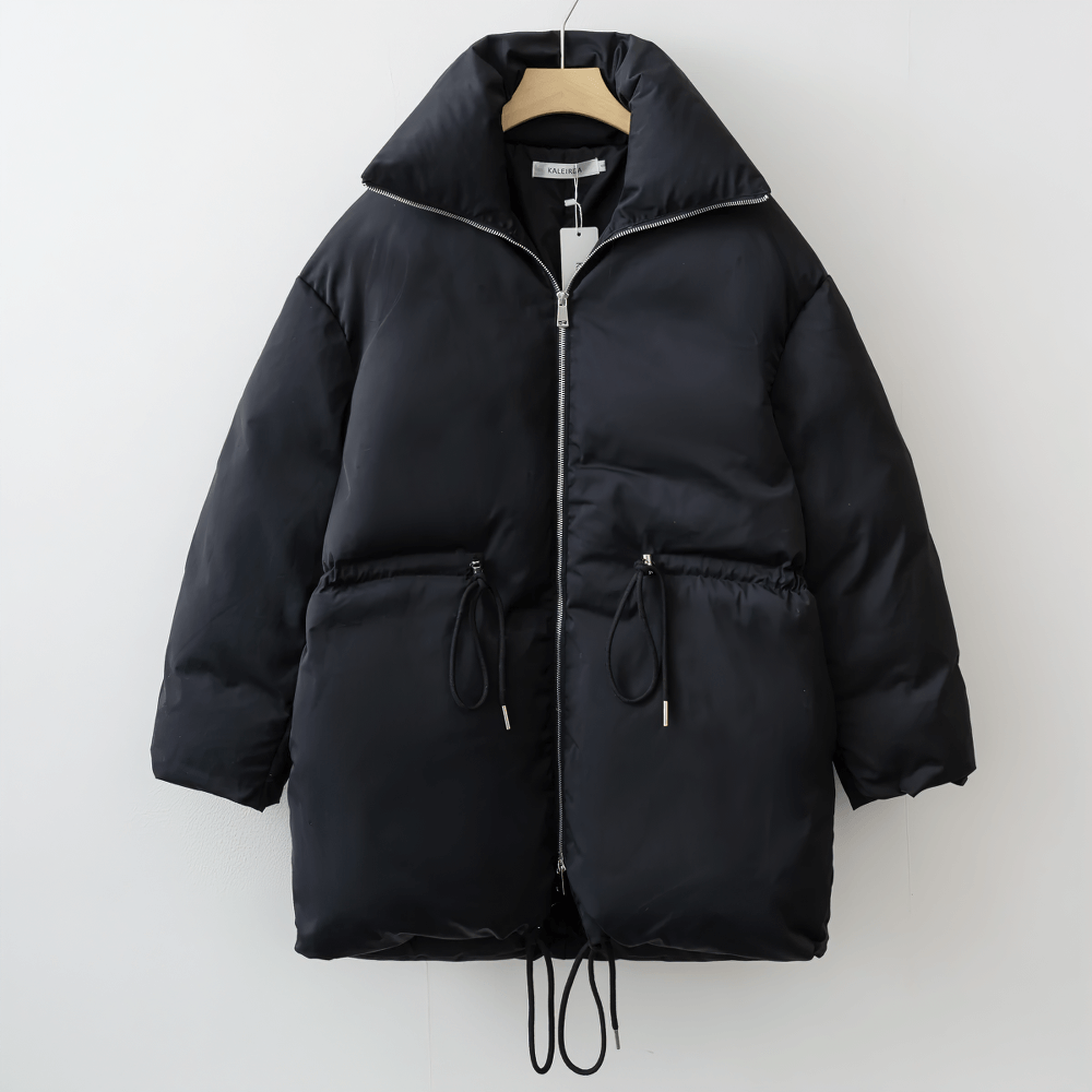 Sleek black slim-fit jacket with adjustable waist and belted closure on hanger, crafted from durable polyester broadcloth fabric.