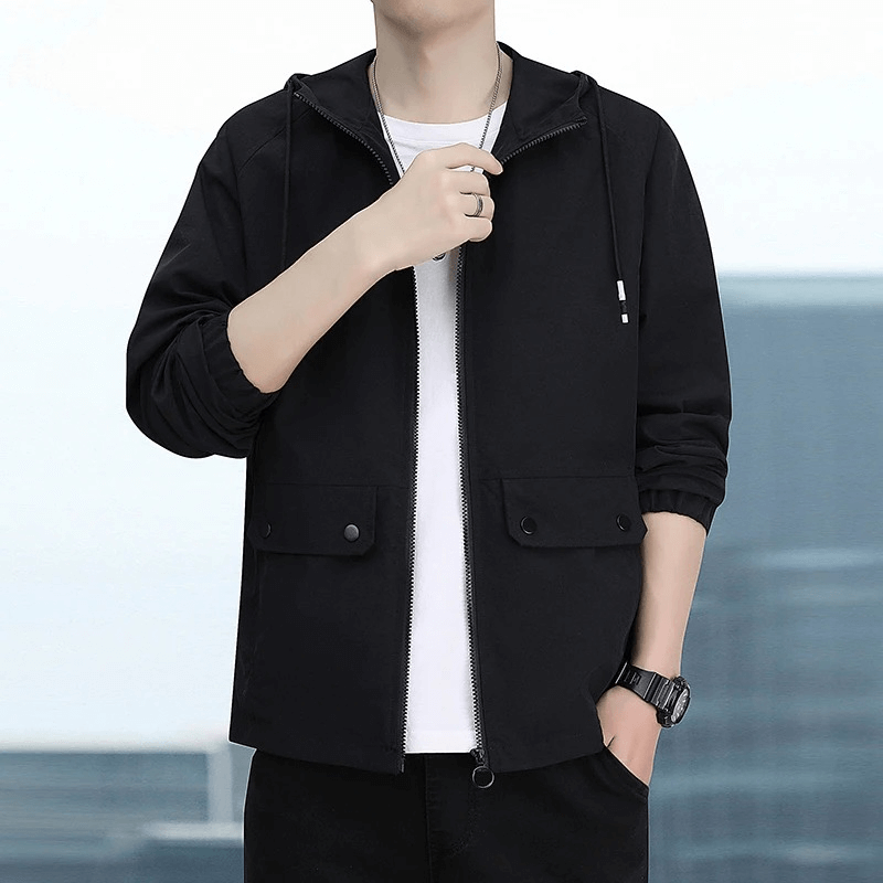 Slim men's sporty jacket with big pockets, zipper closure, rib cuffs, polyester material, perfect for modern everyday wear.