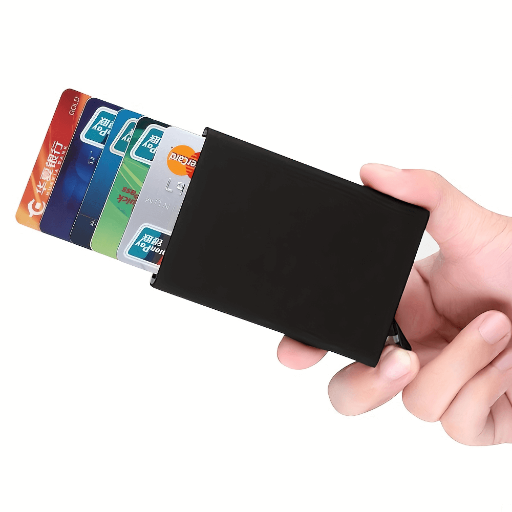 Slim RFID Blocking Metal Credit Card Holder Case SF2674 in hand, sleek black aluminum cardholder protecting cards from unauthorized scans.