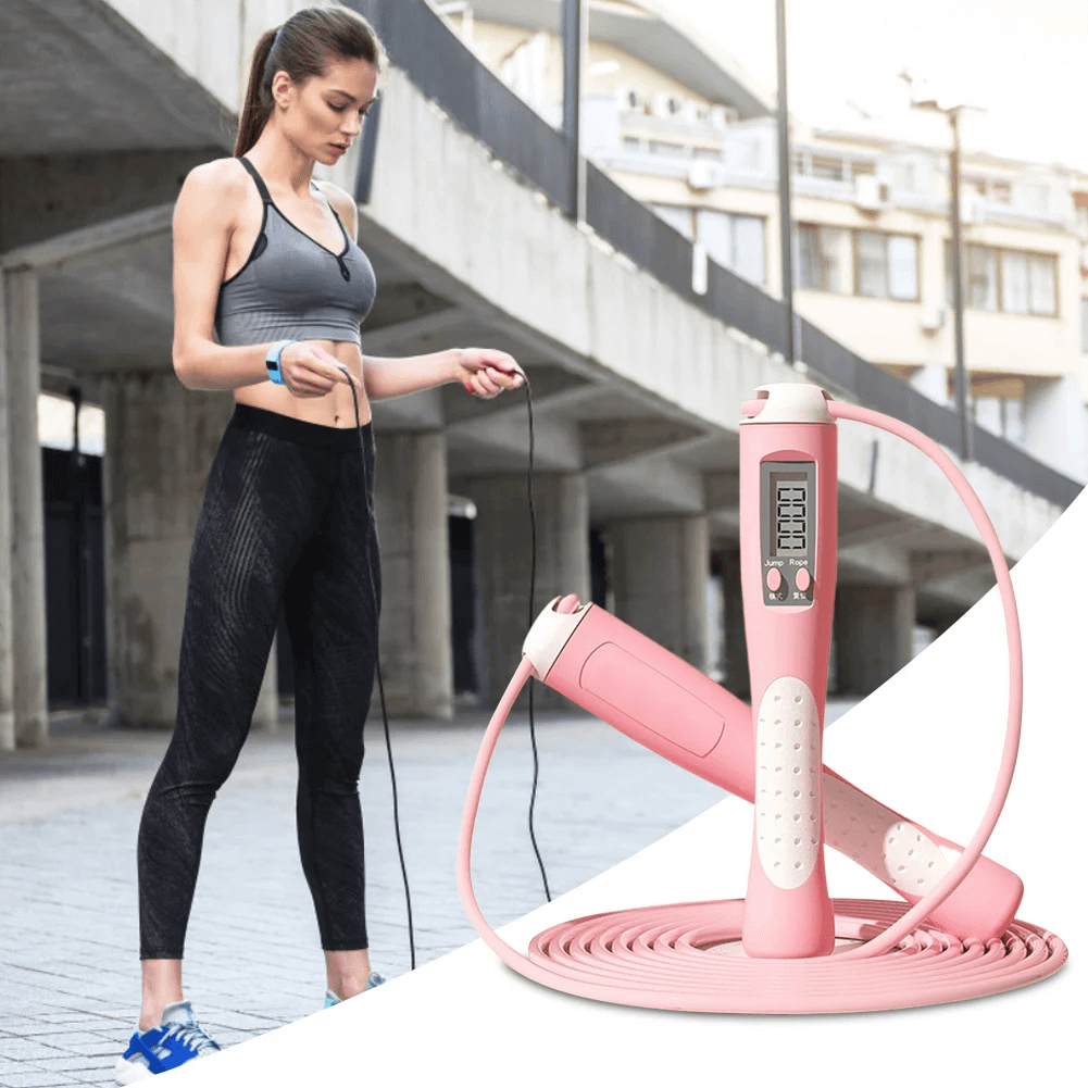 Woman using Smart Calorie Count Jump Rope with LCD Display for an outdoor workout, featuring adjustable length and non-slip handles.