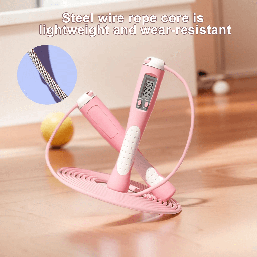 Pink smart jump rope with LCD display and non-slip handles, highlighting lightweight wear-resistant steel wire core.