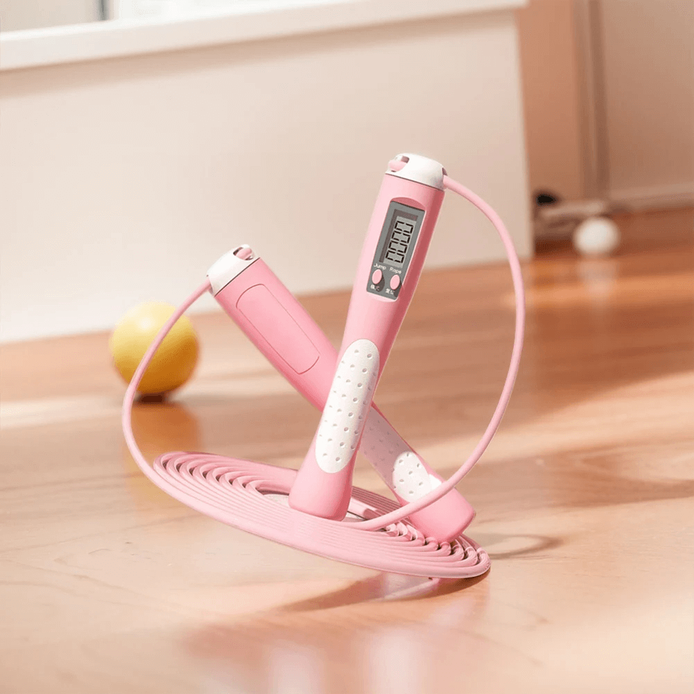 Smart Calorie Count Jump Rope with LCD for fitness, pink, adjustable, non-slip handle, ideal for cardio workouts and weight loss.
