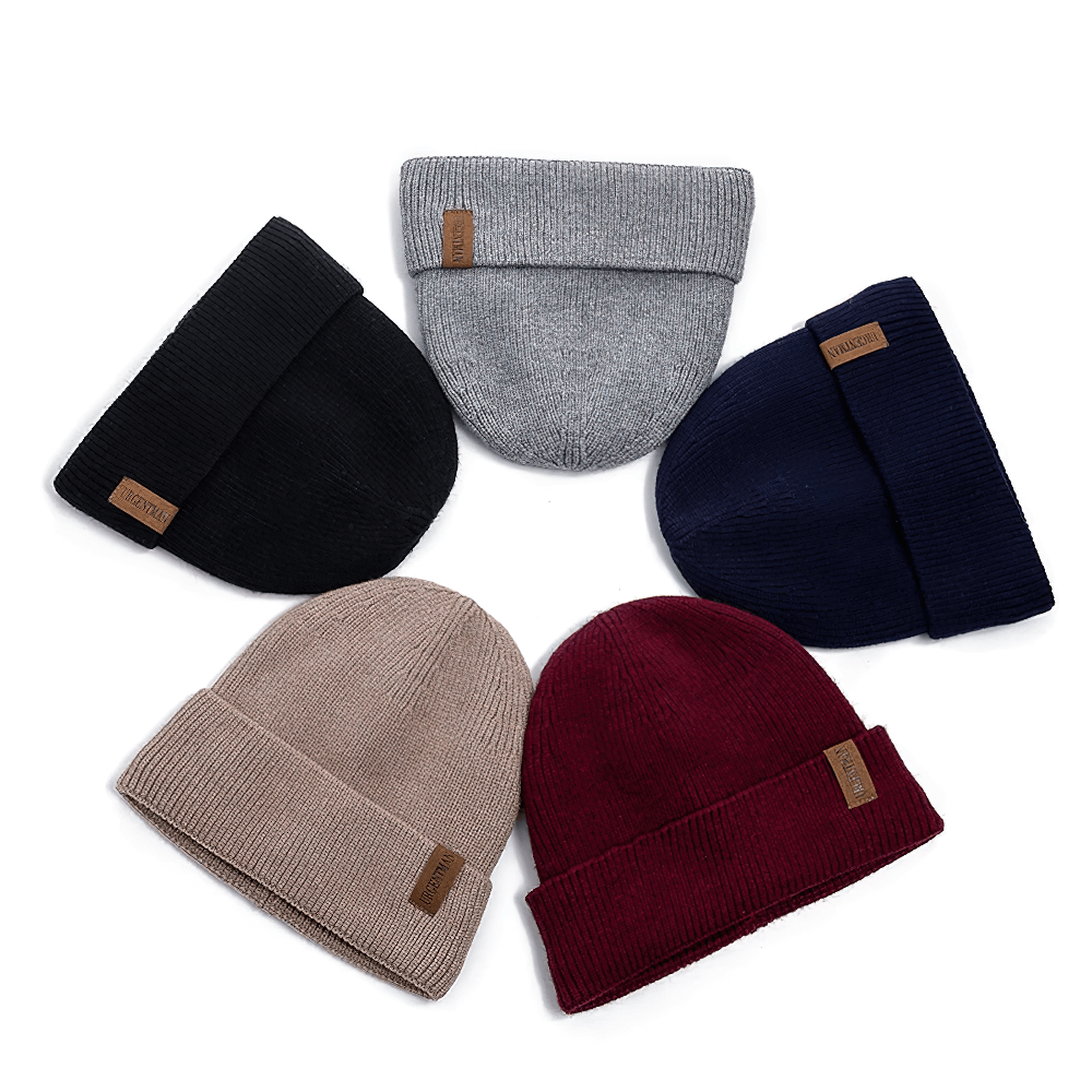 Colorful soft ribbed knit beanies with fleece lining, perfect for cozy winter style and warmth. Versatile accessory for men and women.