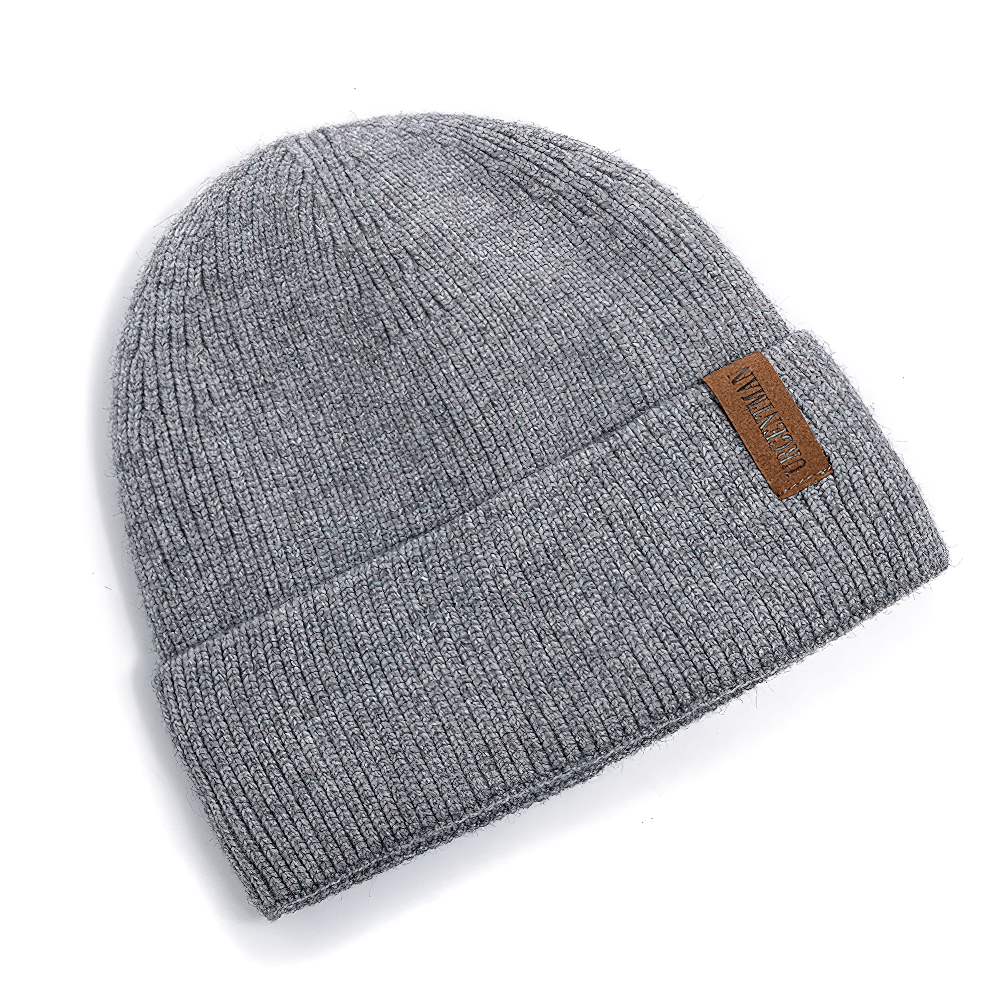 Soft ribbed knit beanie with fleece lining in gray, offering warmth and style. Perfect winter hat for men and women, ideal for chilly days.