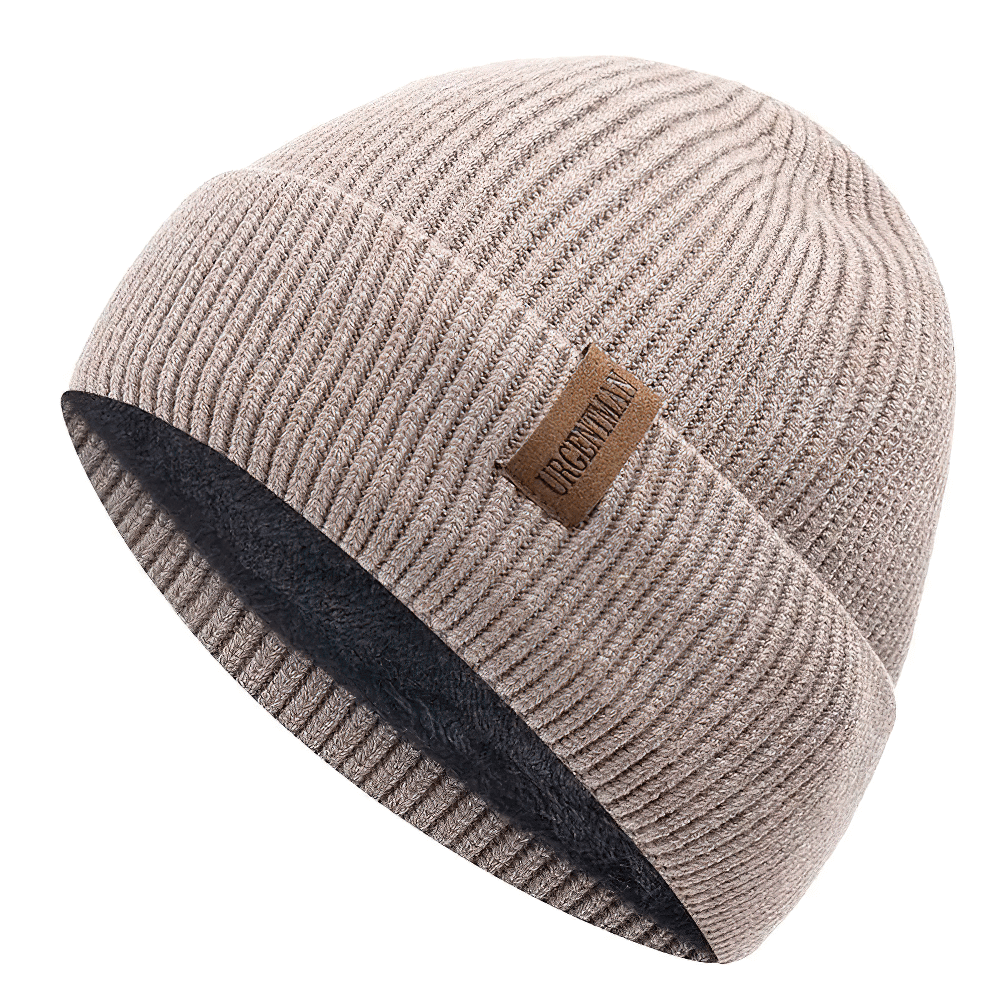 Soft ribbed knit beanie with fleece lining in beige, perfect for warmth and style. Ideal winter accessory for men and women.