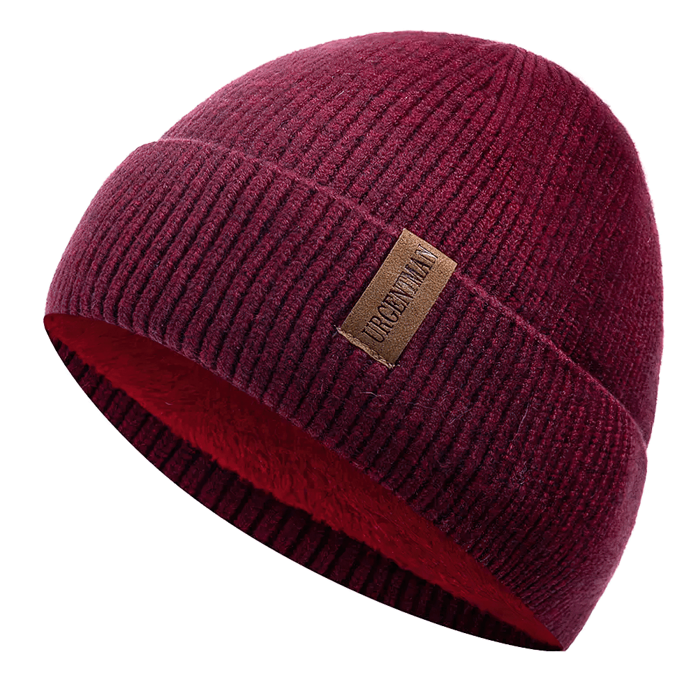 Soft ribbed knit beanie with warm fleece lining in red. Perfect for men and women seeking style and warmth for chilly days.