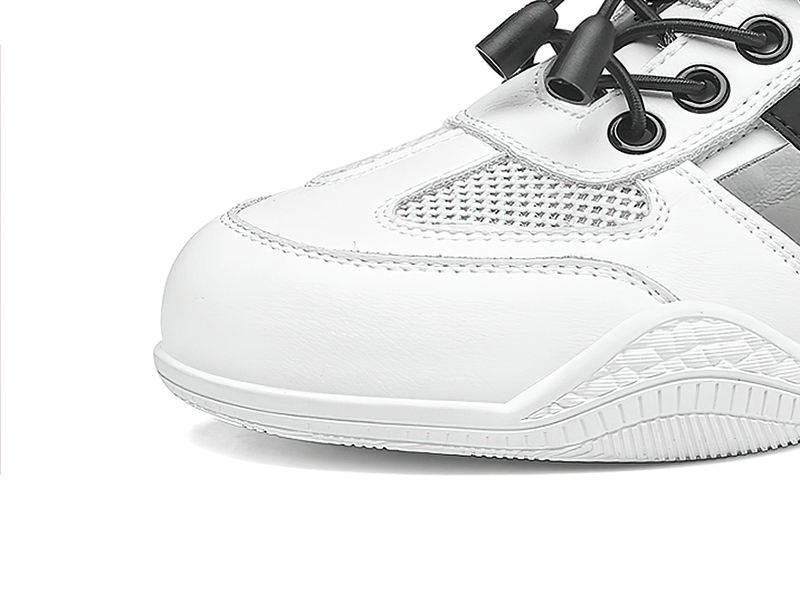 Close-up of white soft-soled breathable casual flat running shoes with lace-up design, featuring durable materials and stylish details.