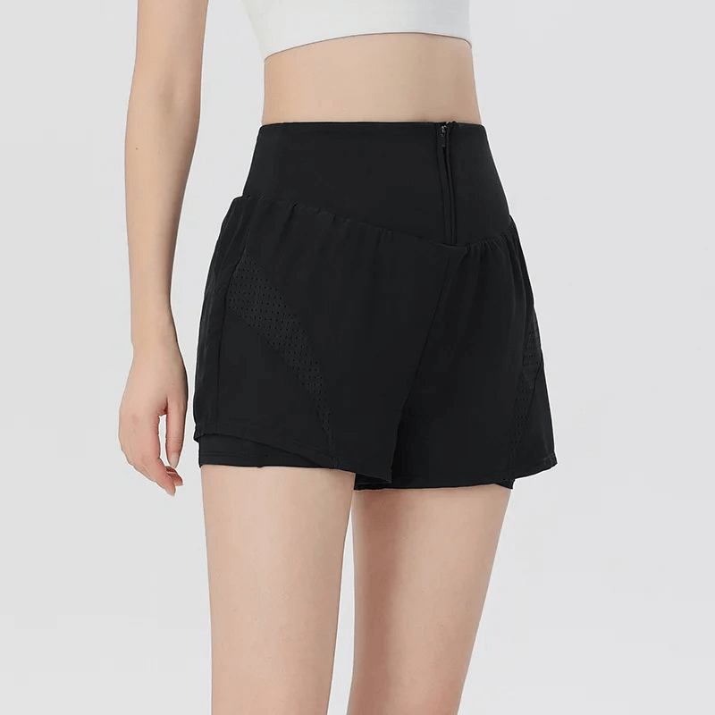 Woman wearing Solid Color Breathable Mesh Panel Gym Shorts with side pocket, ideal for workouts and casual wear - Black