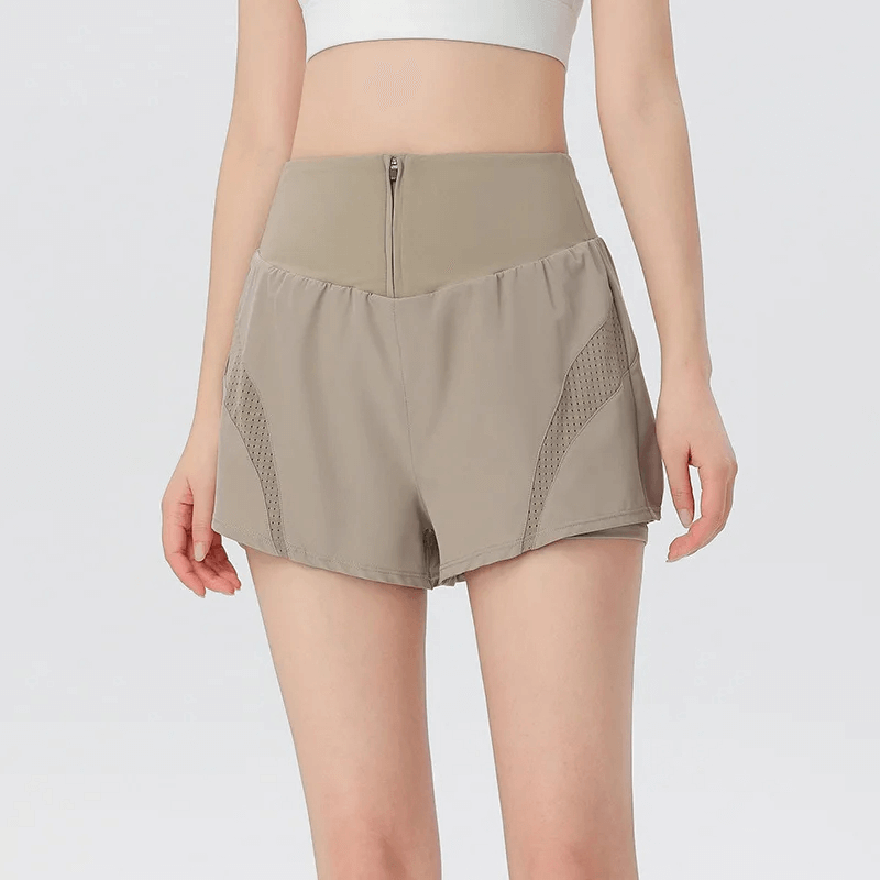 Solid Color Breathable Mesh Panel Gym Shorts SF2230 with Side Pockets for Women, ideal for workouts and casual wear.