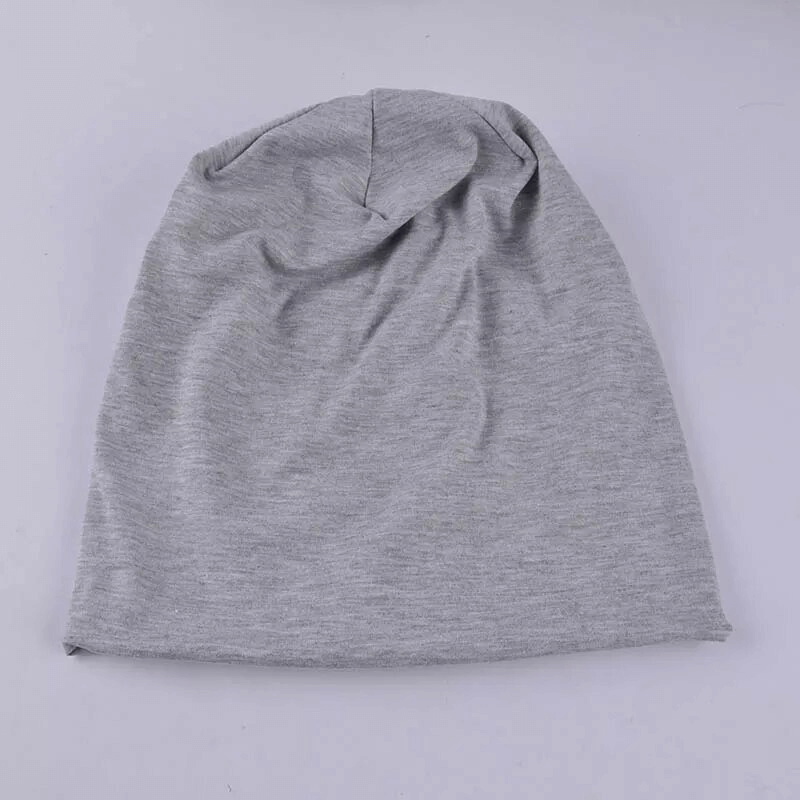 Solid Color Casual Sports Men's Beanie in gray, made from high-quality polyester, offering warmth and style for everyday wear.