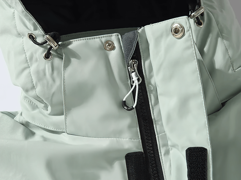 Alt Tag: Solid Color Waterproof Hooded Ski Sports Jacket - SF4298 close-up of waterproof zipper, snap buttons, and hood drawcord