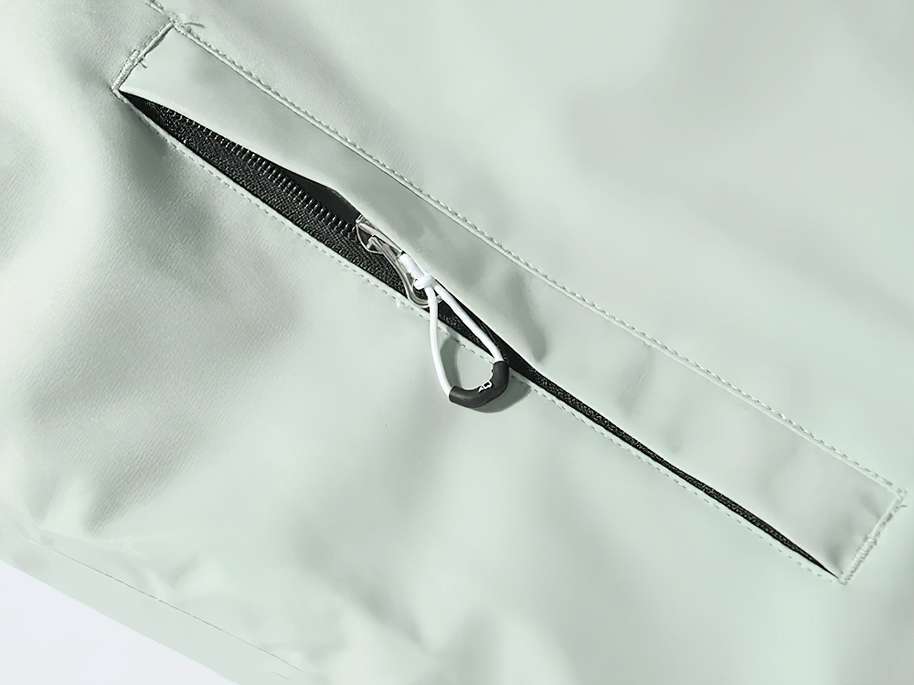 Alt Tag: Solid Color Waterproof Hooded Ski Sports Jacket - SF4298 close-up of waterproof zip pocket, smooth solid shell for ski & snowboard days