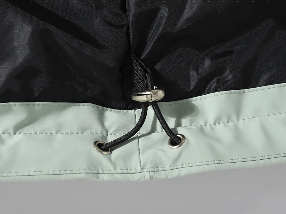 Alt Tag: Solid Color Waterproof Hooded Ski Sports Jacket - SF4298 close-up of adjustable hem drawcord and waterproof snow jacket fabric