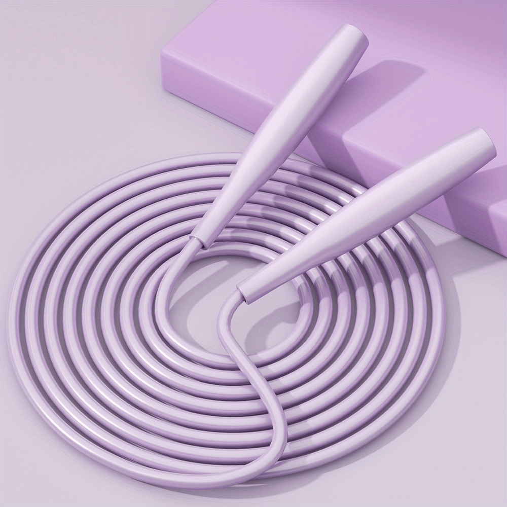 Purple PVC speed skipping rope SF2770 for fitness and workouts, coiled on a purple mat, designed for rapid exercise and weight loss.