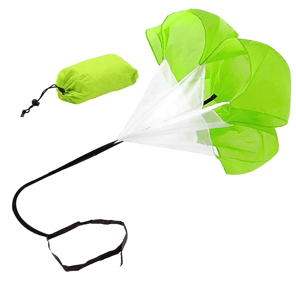 Green running parachute for speed training with adjustable belt and compact carry bag for outdoor sports and agility workouts.