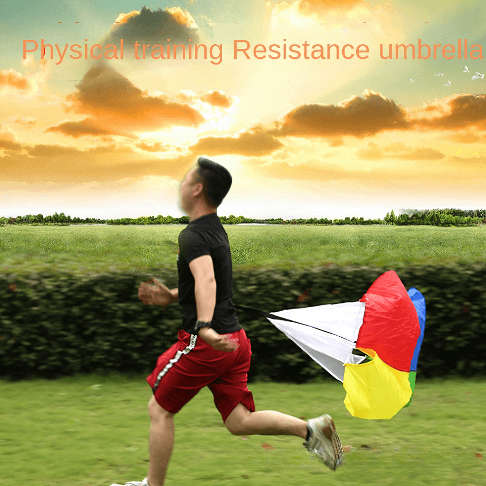 Runner using a multi-color speed training resistance parachute in a field at sunset, boosting leg power and acceleration.