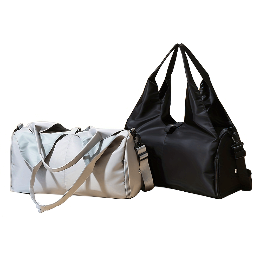 Two stylish sports duffel bags with a spacious main compartment and a shoe pocket, perfect for gym, yoga, and travel.