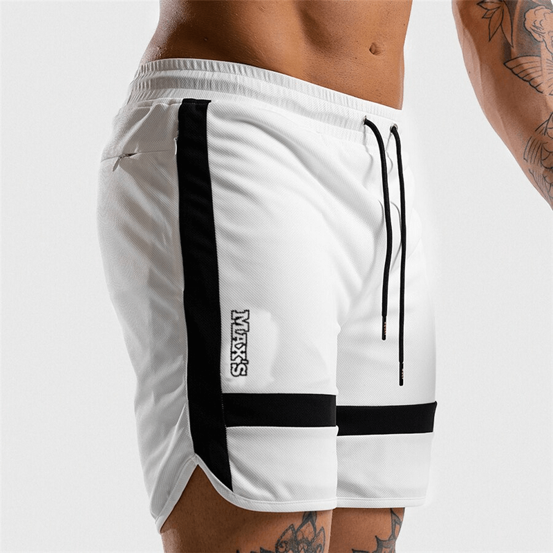 Men's elastic training shorts with drawstring, patchwork design in white and black, ideal for workouts and sports.