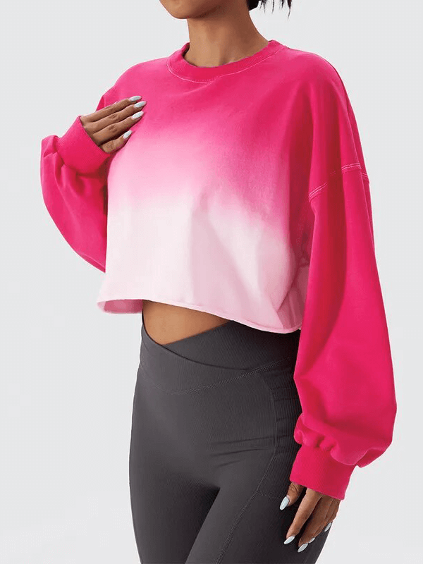 Sports female gradient color long sleeves O-neck crop top in pink and white, ideal for active women seeking style and comfort.