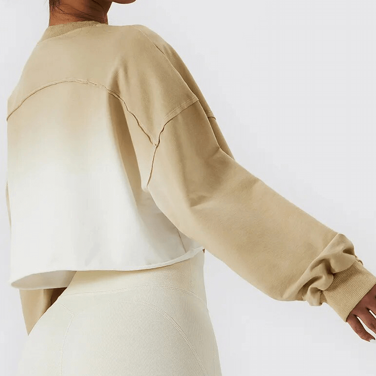Sporty female in beige gradient long sleeve crop top, SF1700, O-neck, breathable cotton. Perfect for active lifestyle comfort.