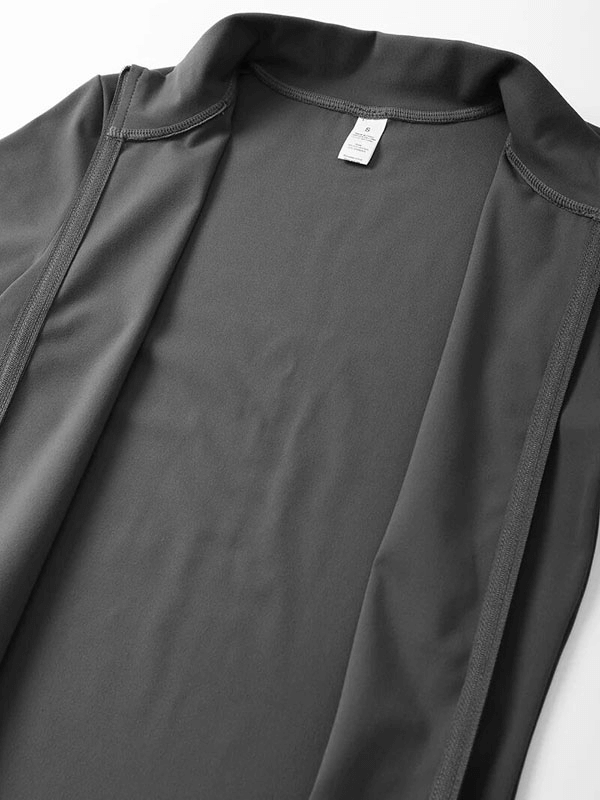 Close-up of black full sleeve top from women's Sports Fitness Set SF1766, featuring lightweight, breathable nylon fabric.