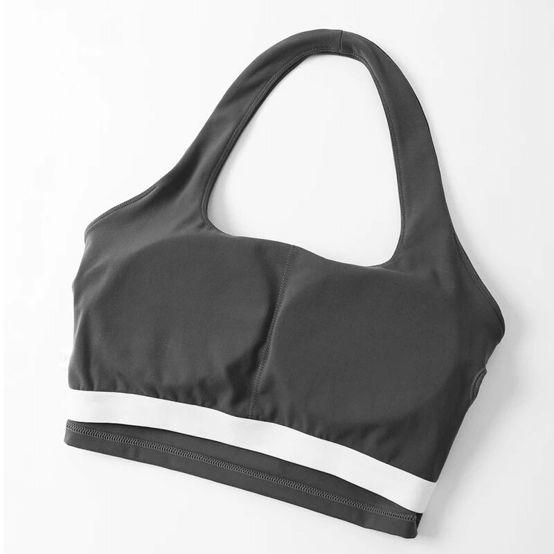 Stylish sleeveless sports bra for women in breathable nylon, perfect for yoga, running, and more. Quick-dry comfort. SF1766