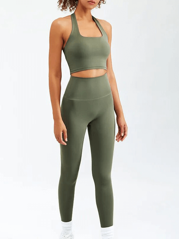 Woman wearing olive green sports fitness set for yoga and running.