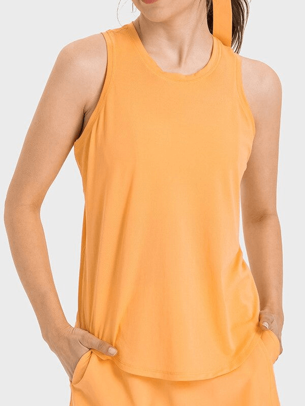 Woman wearing orange sports quick-drying tank top, SF1547, ideal for yoga. Lightweight, breathable, and durable spandex, nylon blend.