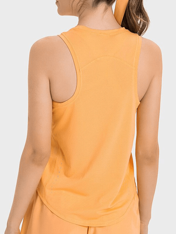 Back view of a woman wearing a lightweight orange tank top designed for yoga, made from quick-drying spandex and nylon fabric.