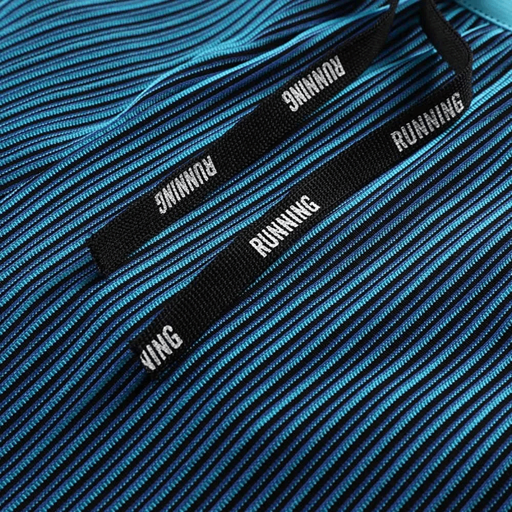 Close-up of blue striped men's compression running shorts with black drawstring labeled 'RUNNING'.