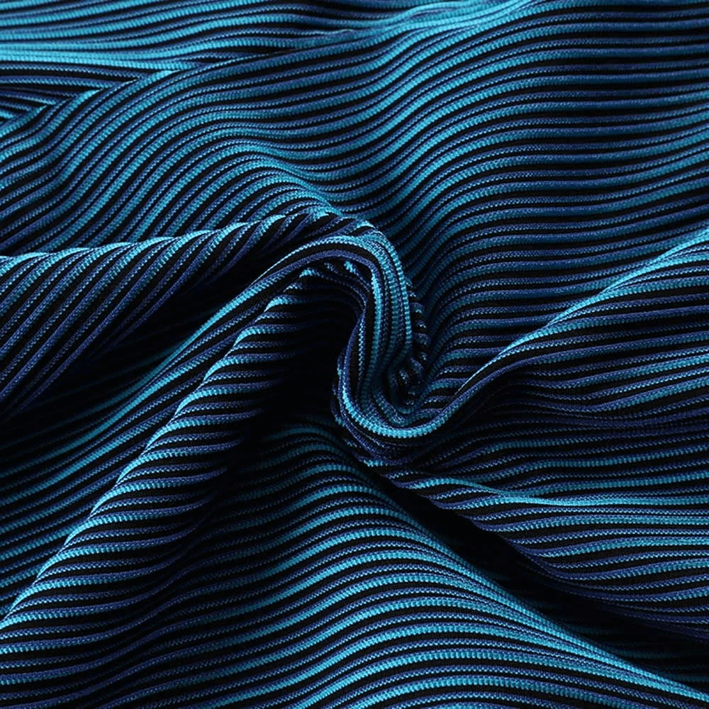 Close-up of striped blue and black fabric showcasing texture and design, ideal for performance sportswear.