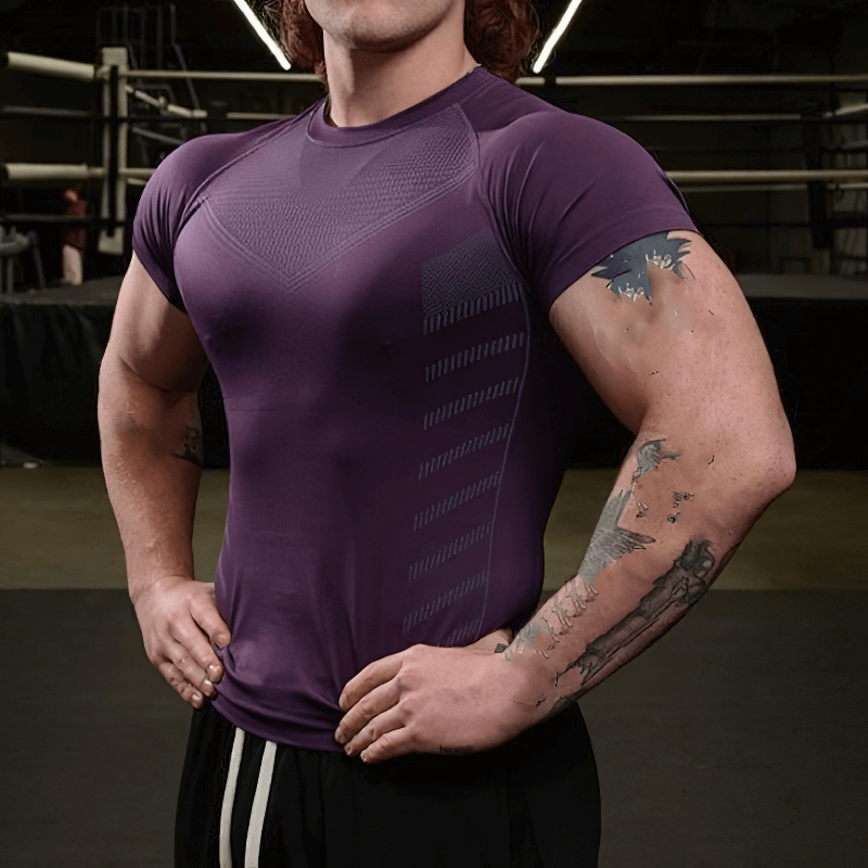 Male model in purple sports quick dry t-shirt for gym, showcasing short sleeves and o-neck design, perfect for workouts.