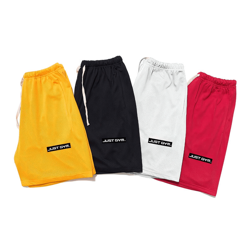 Four pairs of sports mesh men's running shorts in yellow, black, white, and red with pockets, ideal for gym and athletic activities.