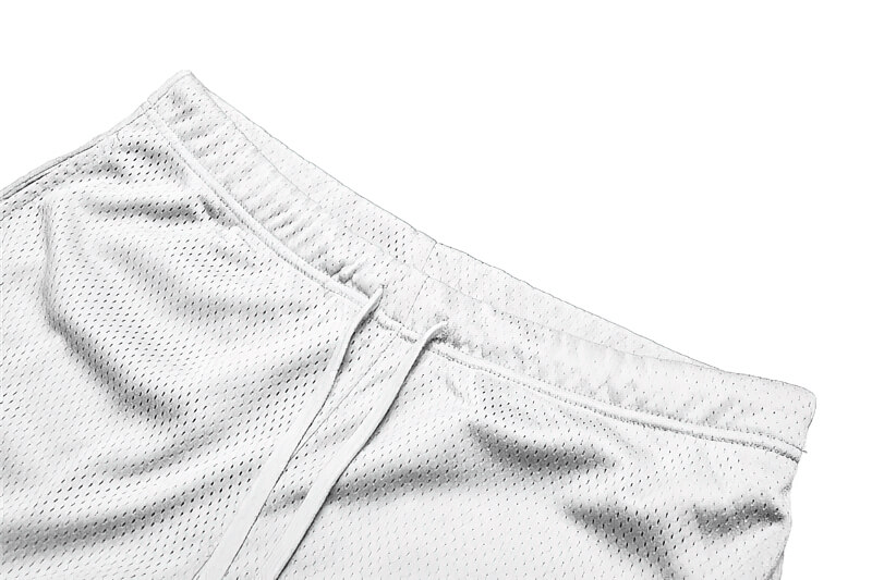 Close-up of white men's sports mesh shorts with drawstring and pockets, perfect for gym and running, style SF0610.