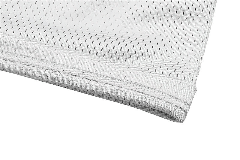 Close-up of white sports mesh fabric from men's running shorts, showcasing breathable material for comfortable workouts.