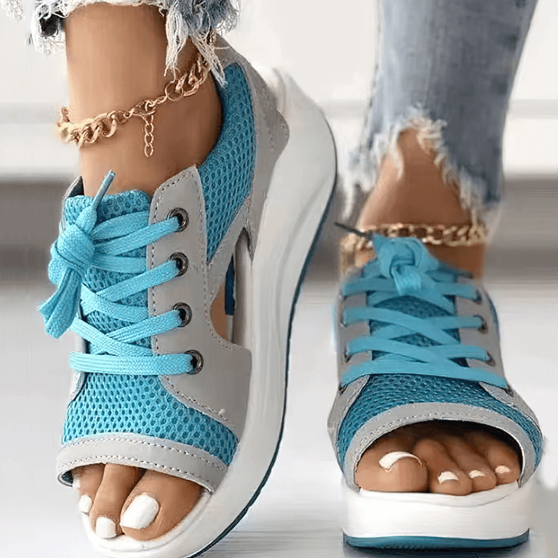 Blue lace-up open toe women's sandals with thick soles, perfect for sporty style and comfort. Air mesh upper and sturdy design.