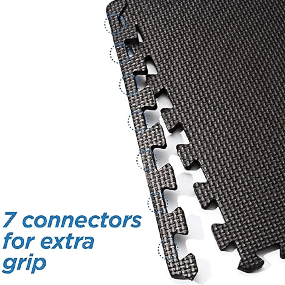 Close-up of a black cross-patterned gym mat with 7 connectors for extra grip, perfect for non-slip stability in yoga and fitness.