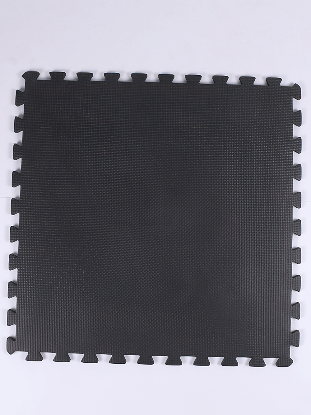 Black cross-pattern non-slip gym mat for yoga and fitness. Durable EVA material, 30x30cm, ideal for custom workout areas.